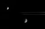 This fanciful view from NASA's Cassini spacecraft spies the Saturnian moons, Dione and Enceladus, from just beneath the ringplane. Enceladus is on the near side of the rings with respect to Cassini, and Dione is on the far side.