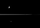 NASA's Cassini spacecraft has Mimas and Pandora on its side as it gazes across the ringplane at distant Tethys. The two smaller moons were on the side of the rings closer to Cassini when this image was taken.