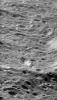 This image from NASA's Cassini spacecraft shows craters within craters cover the scarred face of Saturn's moon Rhea in this oblique, high-resolution view of terrain on the moon's western hemisphere.