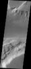 This image from NASA's Mars Odyssey spacecraft shows the Kasei Vallis complex on Mars which contains two main channels that run east-west across Tempe Terra and empty into Chryse Planitia.