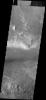 This image shows a small portion of the layered deposits on Mars found in Melas Chasma as seen by NASA's 2001 Mars Odyssey.