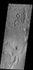 These arcuate fractures on Mars are located on the margin between Memnonia Fossae and Elysium Planitia as seen by NASA's 2001 Mars Odyssey.