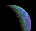 This intense false-color view from NASA's Cassini spacecraft highlights and enhances color variations across the cratered and cracked surface of Saturn's moon Rhea.