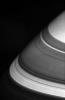 The dark shadows that drape Saturn's northern latitudes are split by three familiar bright gaps as seen by NASA's Cassini spacecraft.