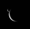 Two slim crescents smile toward NASA's Cassini spacecraft following an occultation event.
