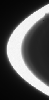 Prometheus zooms across NASA's Cassini spacecraft's field of view, attended by faint streamers and deep gores in the F ring. This frame from a movie sequence of five images shows the F ring shepherd moon shaping the ring's inner edge.