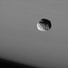 NASA's Cassini spacecraft provides this dramatic portrait of Janus against the cloud-streaked backdrop of Saturn.