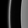 NASA's Cassini spacecraft spied Saturn's shepherd moon, Prometheus, with two long streamers of material that it has pulled out of the F ring. When Prometheus comes close to the F ring in its orbit, the moon's gravity tugs on the ring particles. 