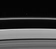 Less intrusive than her sibling shepherd moon, Pandora nonetheless provides a gravitational influence that helps confine and perturb Saturn's F ring's shape. This image is from NASA's Cassini spacecraft.