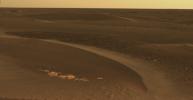 This panoramic view was taken by NASA's Mars Exploration Rover Opportunity on April 27, 2006, as it continued to traverse from Erebus Crater toward Victoria Crater, the rover navigated along exposures of bedrock between large, wind-blown ripples.