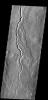 This lava channel is part of the Elysium Mons flows on Mars as seen by NASA's 2001 Mars Odyssey spacecraft.