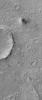 NASA's Mars Global Surveyor shows a cratered plain west of Schiaparelli Crater, Mars. The area captured in this image, and areas adjacent to it, are known for high dust devil traffic.
