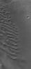 This image from NASA's Mars Global Surveyor shows a steep a field of dark sand dunes in an unnamed crater in the Noachis Terra/Hellespontus region of Mars.