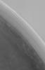 This image from NASA's Mars Global S shows a steep slope in the north polar region of Mars. The stripes indicate an exposure of layered material; the variations in brightness are the result of varying amounts and textures on seasonal carbon dioxide frost.