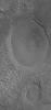 This image from NASA's Mars Global Surveyor shows two mesas on the northern plains of Mars. 'Mesa' is the Spanish word for 'table,' -- a very good description of the two elliptical features.