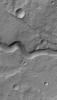This image from NASA's Mars Global Surveyor shows narrow channel on the upper east flank of the martian volcano, Hadriaca Patera. Located on a volcano, this channel was likely formed by lava, perhaps as a lava tube at which the thin roof later collapsed.