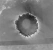 This image from the Mars Orbiter Camera aboard NASA's Mars Global Surveyor spacecraft shows an overview of 'Victoria Crater' and a portion of thearea NASA's Mars Exploration Rover Opportunity has covered to reach the
enormous depression