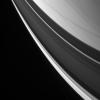 Streaks of cloud are overlain with graceful ring shadows in this view of Saturn's northern latitudes as seen by NASA's Cassini spacecraft.