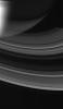 The rings of Saturn glow softly as sunlight from below wends its way through. Some of the Sun's light bounces off the rings' opposite side as seen by NASA's Cassini spacecraft.