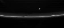 Prometheus pulls away from an encounter with Saturn's F ring, leaving behind a reminder of its passage. This image was taken in visible light with NASA's Cassini spacecraft's narrow-angle camera on April 18, 2007.