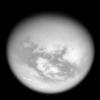Bright mid-latitude clouds near the bottom of this view hint at the ongoing cycling of methane on Titan in this image from NASA's Cassini spacecraft taken on May 13, 2007.
