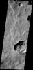 This depression within Cassini Crater contains several slope streaks. The darkest streaks are assumed to be younger than the lighter streaks on Mars as seen by NASA's Mars Odyssey spacecraft.