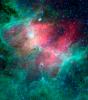This majestic view taken by NASA's Spitzer Space Telescope tells an untold story of life and death in the Eagle nebula, an industrious star-making factory located 7,000 light-years away in the Serpens constellation. 