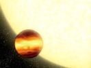 This artist's concept shows a gas-giant planet orbiting very close to its parent star, creating searingly hot conditions on the planet's surface.