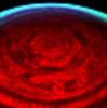 This nighttime view of Saturn's north pole clearly shows a bizarre six-sided hexagon feature encircling the entire north pole as seen by NASA's Cassini spacecraft.