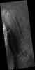 Layers and Dark Debris in Melas Chasma