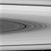 On Jan. 29, 2008, NASA's Cassini spacecraft examined the Maxwell Gap, the large, dark division at center, which is surrounded on either side by the broad, isolated and bright ring regions, or 'plateaus,' of Saturn's outer C ring.