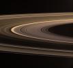 Saturn's softly glowing rings shine in scattered sunlight in this image captured by NASA's Cassini spacecraft. This view looks toward the unilluminated side of the rings from about 5 degrees above the ringplane.