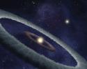 This artist's conception shows a binary-star, or two-star, system, called HD 113766, where astronomers suspect a rocky Earth-like planet is forming around one of the stars.