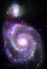 A composite image of M51, also known as the Whirlpool Galaxy, shows the majesty of its structure in a dramatic new way through several of NASA's orbiting observatories.