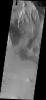 This image from NASA's Mars Odyssey shows the northern wall of Melas Chasma near Ophir Labes. Landslide deposits are evident on the bottom right side of the image.