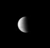 Surface details on Titan are seen faintly through the murky haze of the moon's atmosphere. This image was taken with NASA's Cassini spacecraft's wide-angle camera on July 30, 2008 using a spectral filter sensitive to wavelengths of infrared light.