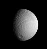 NASA's Cassini spacecraft provides a view of the southern portion of Tethys' trailing hemisphere. Prominent features include the huge canyon, Ithaca Chasma, as well as Demodocus and Telemus, large basins just to the right of the rift.