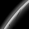 NASA's Cassini spacecraft snapped this image of Saturn's Prometheus and its shadow, just as the moon was creating a new streamer in the ring. This image was taken on Jan. 14, 2009.