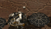 This image shows how NASA's three-legged Phoenix Mars Lander is able to get a better look at its footing and the physical characteristics of the underlying soil on the surface of the Red Planet.