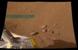 NASA's Phoenix Mars Lander shows a hole in the ground produced by the first Robotic Arm dig at its landing site on Mars.