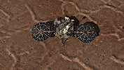 This image shows an overhead view of NASA's Phoenix Mars Lander and the work area of the Robotic Arm. 