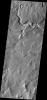This image from NASA's Mars Odyssey shows the eastern margin of Tempe Terra on Mars dissected by channels of many sizes.