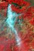 The Yolla Bolly Complex Wildland Fire was started on June 21, 2008 by a lightning strike. This image was acquired by NASA's Terra spacecraft. The burned area is charcoal-colored, surrounding forest and vegetation is red. Smoke is light blue-gray.