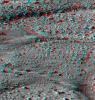 This anaglyph, acquired by NASA's Phoenix Lander's Surface Stereo Imager on June 8, 2008, shows a stereoscopic 3D view of the Martian surface near the lander. 3D glasses are necessary.