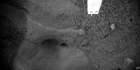 This image of 'Snow Queen,' was taken by the Robotic Arm Camera (RAC) aboard NASA's Phoenix Mars Lander.