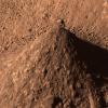 As NASA's Phoenix Mars Lander excavates trenches, it also builds piles with most of the material scooped from the holes. The piles, like this one called 'Caterpillar,' provide researchers some information about the soil.