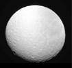 NASA's Cassini spacecraft's narrow-angle camera captured Saturn's moon Rhea as it gradually slipped into the planet's shadow, an event known as 'ingress,' on Aug. 19, 2008.