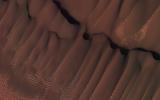 This image was taken by NASA's Mars Reconnaissance Orbiter during the Martian northern summer, thus there is no frost present on the dunes.