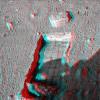 The robotic arm on NASA's Phoenix Mars Lander enlarged a trench beside a rock called 'Headless' on Sept. 20, 2008 in preparation for sliding the rock into the trench. 3D glasses are necessary to view this image.