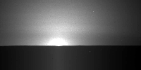 This frame from a sequence of nine images taken by the Surface Stereo Imager on NASA's Phoenix Mars Lander shows the sun rising on the morning of the lander's 101st Martian day after landing.